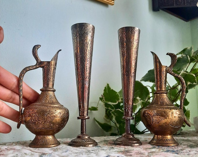 Small antique Anglo-Indian brass décor; a pair of bud vases and a pair of cobra jugs.