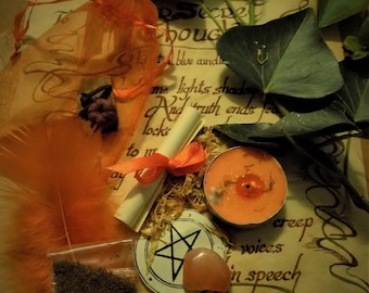 May include: A witchy spell kit with an orange feather, a small bag of herbs, a rolled up scroll tied with a red ribbon, a pentagram charm, a pink crystal, a small orange candle, and a piece of parchment with the words "Secret Thoughts" and "creep voices in speech" written on it.