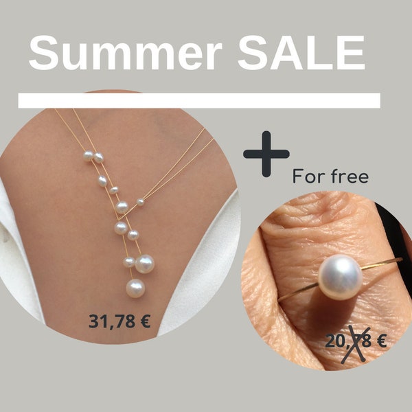Pearl necklace on a wire of gold and a gold ring with freshwater pearl for free