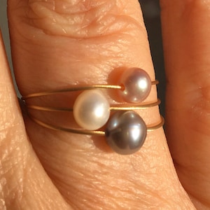 Jewelry Set. Pearl necklace on a wire of gold and a gold ring with freshwater pearl. image 7
