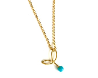 Tourquoises necklace in gold. Handmade. Pendant in gold with a turquoise stone ball. Delicate necklace with leaves