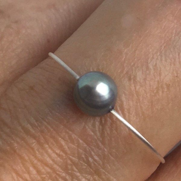 Pearl ring. Dainty ring. Gray freshwater pearl on a wire of silver. Stackable