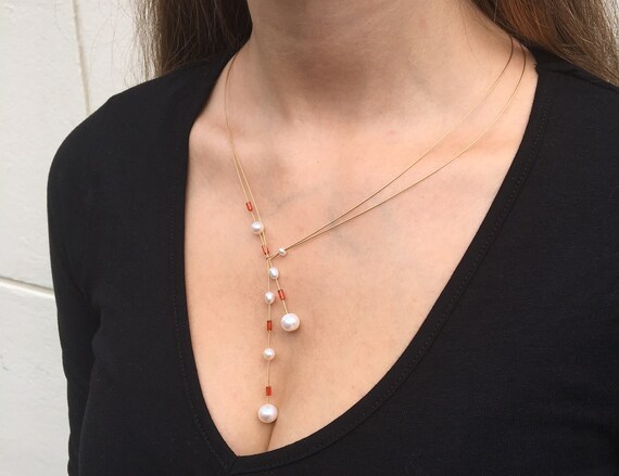 Pearl necklace in a cheap can