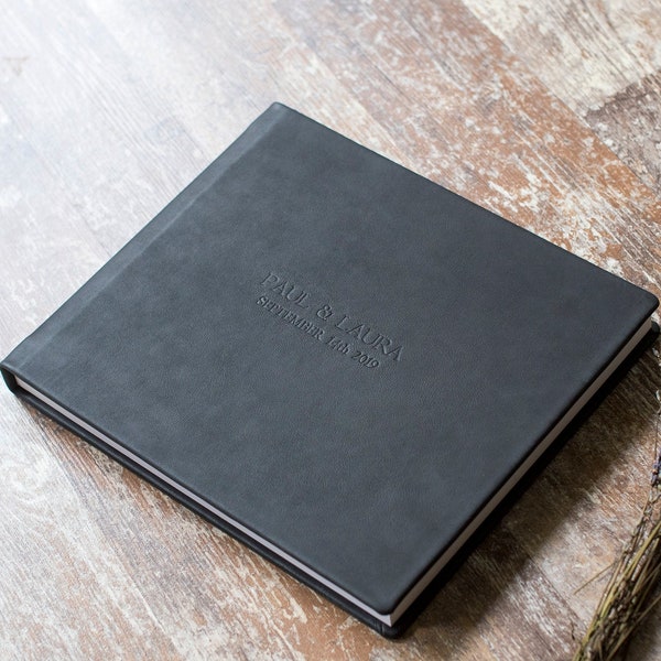 Premium Guest Book in black leather with names on the cover - leather wedding photo album