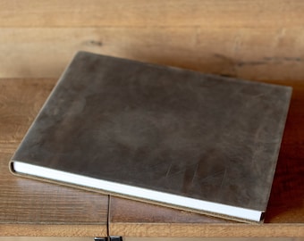 Leather bound lay flat wedding album with custom engraving