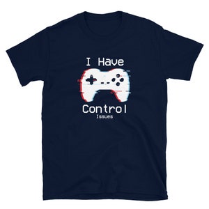 May include: A navy blue t-shirt with a white video game controller graphic and the text "I Have Control Issues".