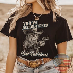 You&#39;ve Just Buttered Your Last Biscuit Western Cowboy Cat Design Unisex Comfort Colors T-Shirt, Sweatshirt