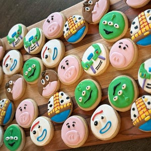 Cowboy, alien, pig, spoon, buzz decorated sugar cookies birthday, special occasion