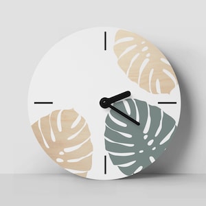 Horloge murale en bois avec feuille de Monstera : déco scandinave moderne