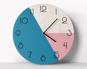 Geometric wall clock with numbers Round wooden clock in deep teal blue and pale pink colors Minimalist wooden clock