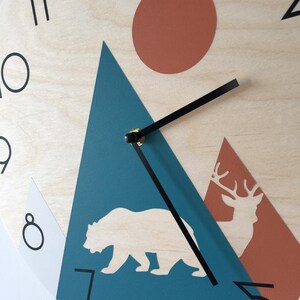 A close-up of the Minimalist wooden wall art with bear and deer.