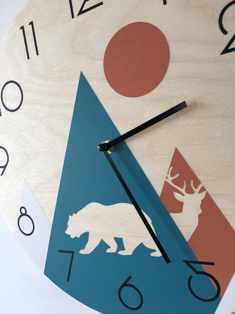 A close-up of the Minimalist wooden wall art with bear and deer.