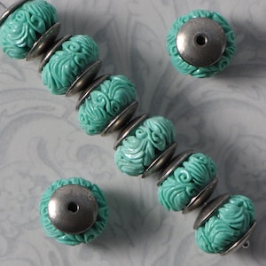 13 X 11mm Faux Hand Carved Angel Skin Turquoise Resin Beads With Silver Caps