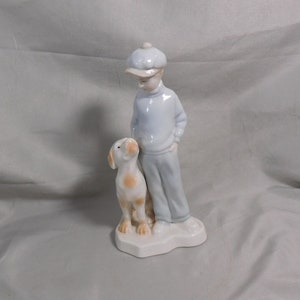 Boy with Dog Ceramic Figurine