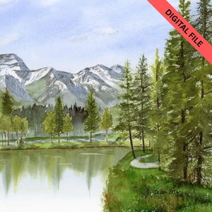 May include: Watercolor landscape painting of a mountain range with snow-capped peaks reflected in a lake. Lush green trees line the water's edge and the foreground. A red banner in the upper right corner reads "DIGITAL FILE".