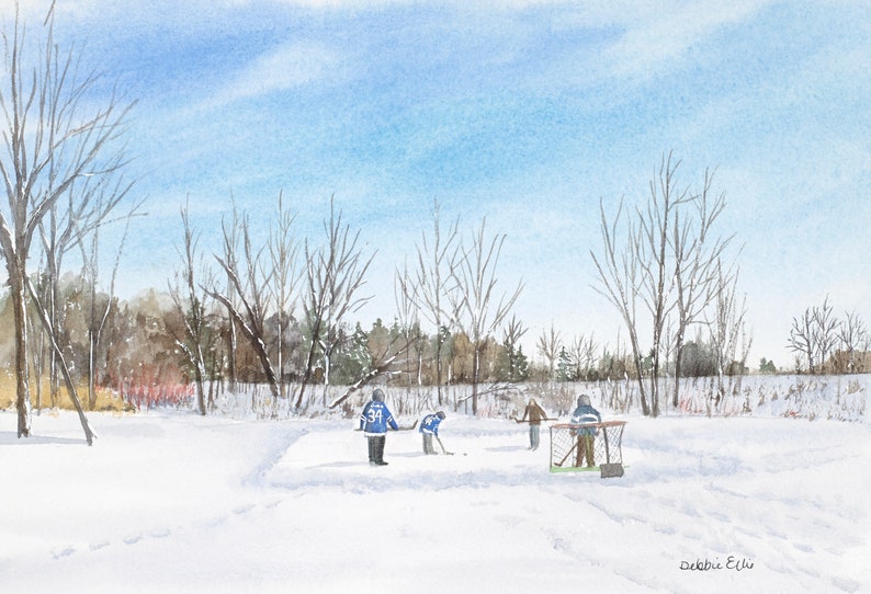 May include: A watercolor painting of a winter scene with a group of people playing hockey on a frozen pond. The pond is surrounded by trees and snow. The sky is blue and there are clouds in the sky. The painting is signed "Debbie Ecks" in the bottom right corner.