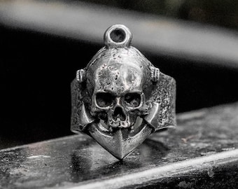 Hand sculpted anchor sailor jawless skull ring. Oxidized lead free pewter and brass anchor skull rings
