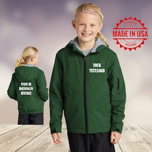 May include: A green hooded jacket with a zipper closure. The jacket has a white embroidered design on the front that says "YOUR TEXT/LOGO". The jacket is made in the USA.