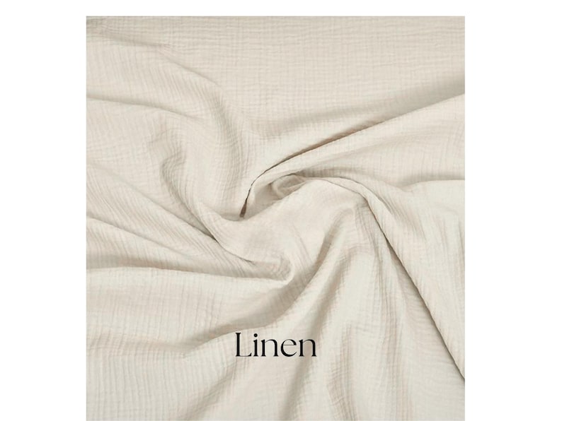 May include: Cream-colored linen fabric with a textured, crinkled appearance. The fabric is draped and folded, creating soft shadows and highlights. The word "Linen" is printed in black at the bottom of the image.