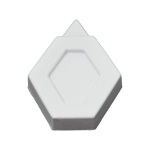 May include: A white, geometric-shaped object with a hexagonal base and a diamond-shaped indentation in the center. A triangular piece extends from the top. The object has a glossy finish and appears to be made of a solid material.