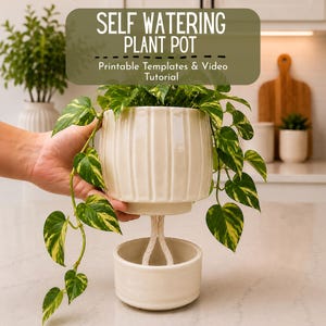 May include: A cream-colored, vertically ribbed self-watering plant pot with a matching base reservoir connected by a white rope. The text "SELF WATERING PLANT POT" and "Printable Templates & Video Tutorial" is displayed above the plant.