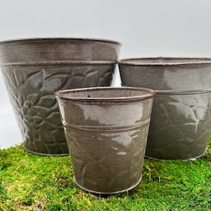 Embossed Floral Metal Planter: Rustic Gray Vintage Style