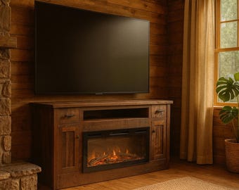 May include: A dark brown wooden entertainment center with a built-in electric fireplace and a large black television mounted above it. The fireplace has a realistic flame effect. The room has wood paneling and a window with a plant.