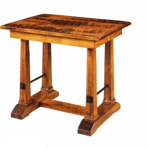 May include: A small, wooden side table with a rectangular top and four sturdy legs. The table is made of light brown wood with a distressed finish on the top. It features a black metal bar for support. The table measures approximately 24 inches high.