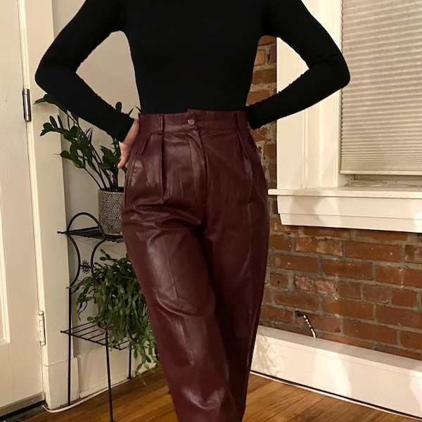 Vintage vegan leather high waist pleated trousers Vinyl burgundy wine red 80s 90s faux tapered pants Womens True size 24 W size XS 2 USA