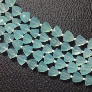 AAA Aqua Chalcedony Faceted Trillion Beads: 6&quot; Strand, 6/8mm