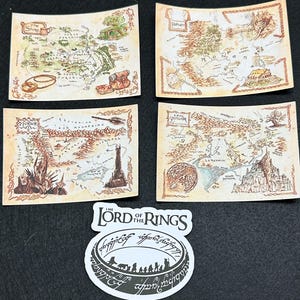 May include: Four vintage-style maps of Middle-earth from The Lord of the Rings, featuring locations like The Shire, Rohan, Mordor, and Gondor. The maps are printed on a cream-colored paper with brown ink and have a worn, aged look. A sticker with the words "The Lord of the Rings" and the One Ring is also included.