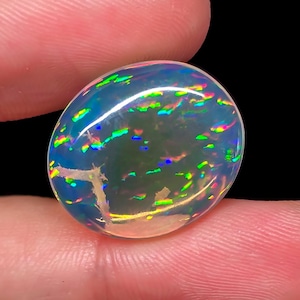 Ethiopian Opal Cabochon: 13.5 Ct Oval Gemstone for Jewelry Making