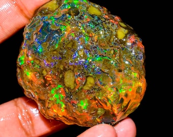 Natural Ethiopian Opal Rough: Oil-Treated Gemstone for Jewelry (275.5 Ct, 50X44X24 MM)