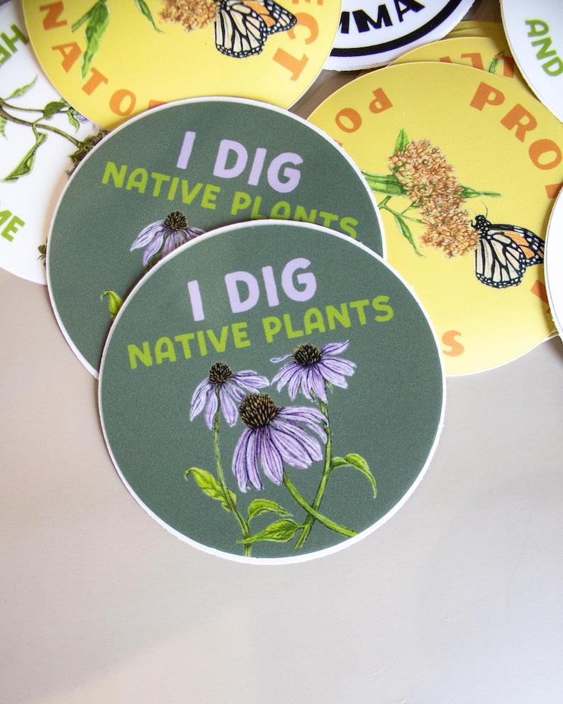 May include: Round stickers with the text "I DIG NATIVE PLANTS" and illustrations of purple coneflowers. Other stickers feature butterflies and text on a yellow background. The stickers have a white border.