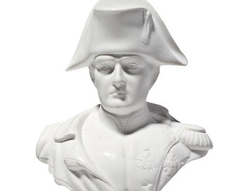 May include: White porcelain bust of Napoleon Bonaparte wearing a bicorne hat. The bust is on a black base.