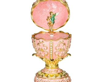 Caja de música con forma de huevo estilo Fabergé con figura de hada, 12,5 cm (5 pulgadas), color rosa.