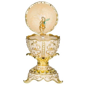 Faberge Style Egg Music Box with fairy figurine 5&#39;&#39; (12.5 cm) cream