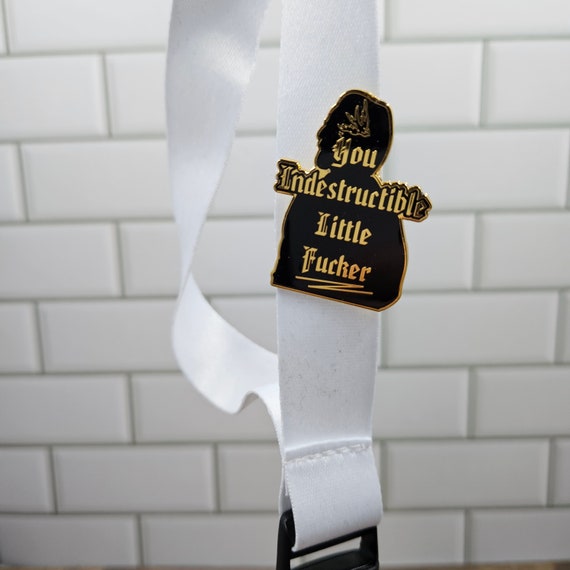 Indestructible Izzy Hands Enamel Pin