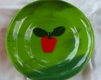 Green bowl with apple