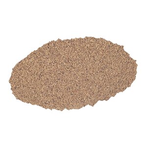 May include: A close-up of a pile of brown granulated coffee grounds.