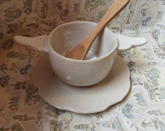 Stoneware pearly white cup or little bowl with the dish