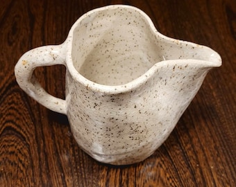 Small jug beige ceramic with black dots glazed with cracked effect