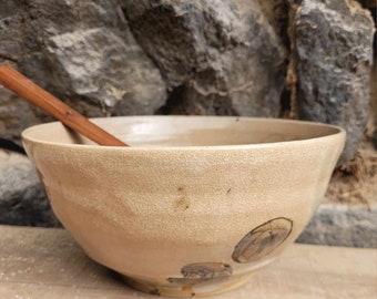 Potrery beige salad bowl with lare gray points and cracked effect