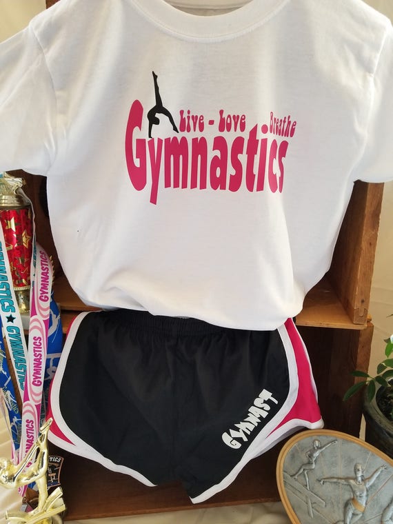 Gymnast running shorts with a" Gymnastics live love breathe" t-shirt 