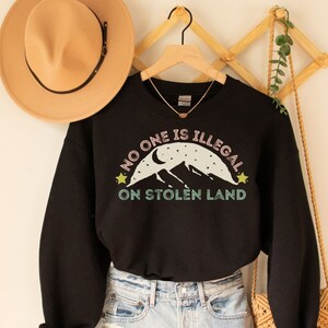 No One is Illegal on Stolen Land Sweatshirt, Antiracist T-Shirt, Pro Immigrant Tee, Human Rights, Abolish ICE, Social Justice Activism Gift