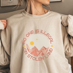 No One is Illegal on Stolen Land Sweatshirt: Antiracist Social Justice Tee