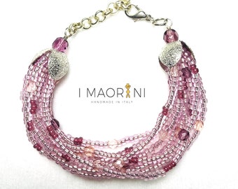 Armband multi streng roze glas kralen