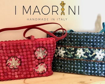 Shoulder bag with wooden discs and mother of pearl flowers
