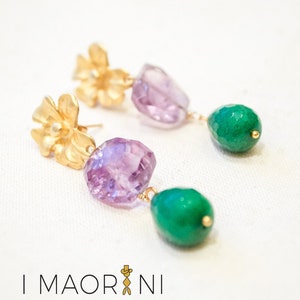 Earrings dangle with amethyst and emerald drops