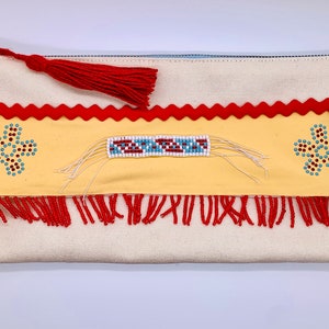 Astuccio portatutto, pochette fatta a mano con nappina, astuccio portatrucco, borsetta per ragazza